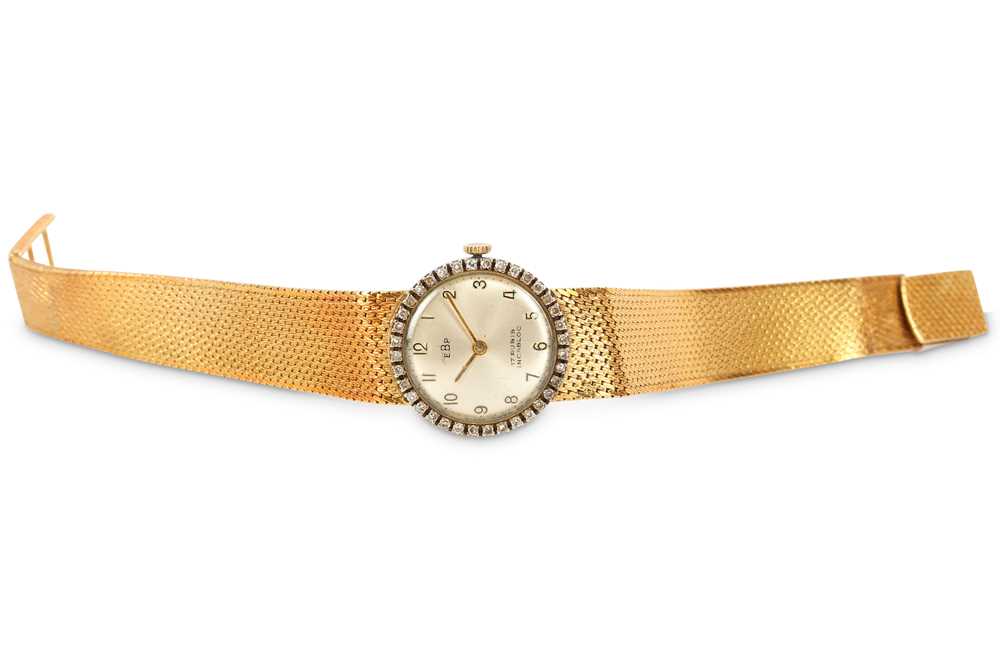 Lot 650 - E.B.P. A ladies vintage 18K gold manual wind