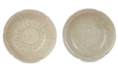 Lot 954 - A PAIR OF CHINESE MOULDED DISHES. Yuan Dynasty....