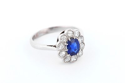 Lot 287 - A sapphire and diamond ring, diamonds approx....