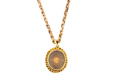 Lot 118 - A hairwork pendant necklace, The oval cabochon...