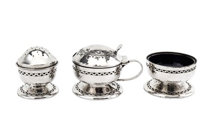 Lot 291 - A George V sterling silver three-piece cruet,...