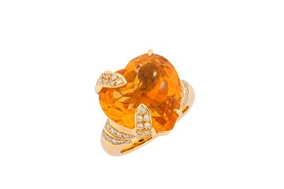 Lot 235 - A citrine and diamond dress ring...