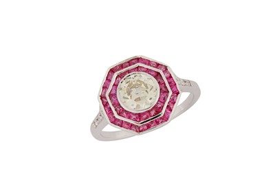 Lot 164 - A diamond and ruby dress ring The collet-set...