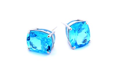 Lot 308 - A pair of blue topaz earrings, mounted in 9...