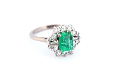 Lot 299 - An emerald and diamond cluster ring, diamonds...