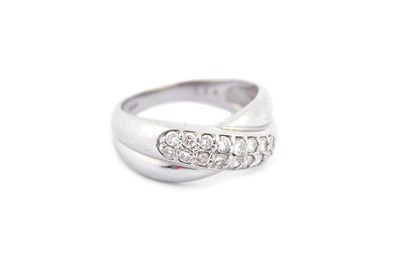 Lot 302 - A diamond dress ring, of pavé-set...