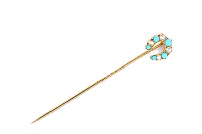 Lot 279 - A diamond and turquoise-set horseshoe stick...