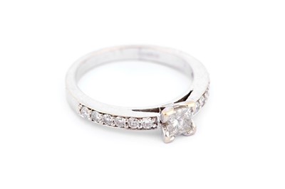 Lot 301 - A diamond single-stone ring, with diamond...