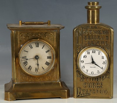 Lot 176 - Brass linctus advertising bottle clock case...