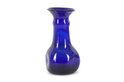 Lot 882a - A HOT-WORKED COBALT BLUE GLASS VASE Possibly...