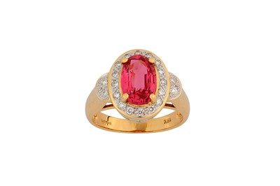 Lot 45 - A spinel and diamond ring The oval-cut spinel...