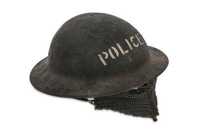 Lot 179 - A WWI MK1 steel helmet, fitted with second...