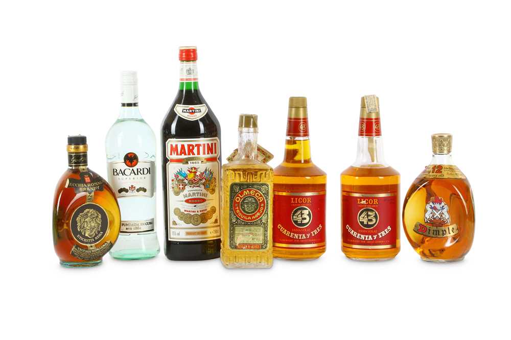 Lot 750 - An assortment of 7 bottles of spirits, ideal...