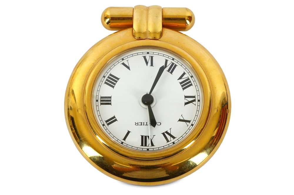 Lot 657 - CARTIER. A PLATED QUARTZ ALARM CLOCK Movement:...