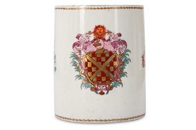 Lot 513 - A CHINESE FAMILLE ROSE ARMORIAL MUG. Qing...