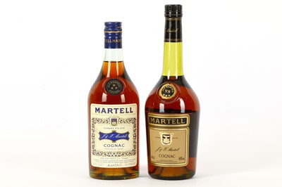 Lot 754 - Two bottles of Martell from different eras. 1...