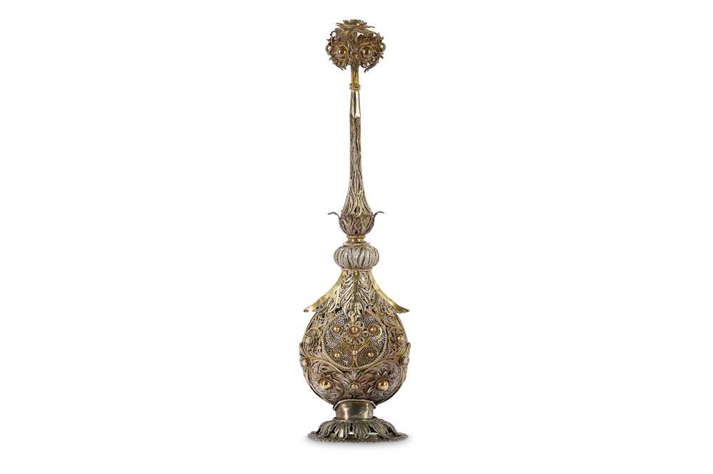 Lot 284 - A PARCEL-GILT SILVER FILIGREE ROSEWATER...