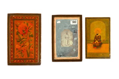 Lot 248 - *A QAJAR  LACQUERED PAPIER-MÂCHÉ MIRROR CASE...