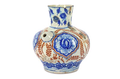 Lot 216 - *A SAFAVID BLUE AND RED POTTERY WATER PIPE...