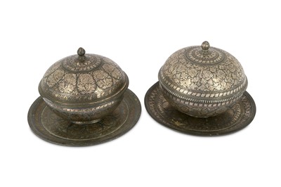 Lot 299 - A NEAR-PAIR OF BIDRI SILVER-INLAID LIDDED...