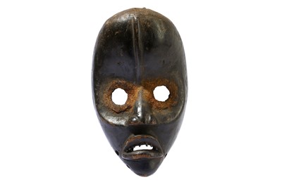 Lot 251 - A WOOD DAN MASK, IVORY COAST Depicted with a...