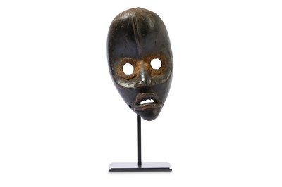 Lot 251 - A WOOD DAN MASK, IVORY COAST Depicted with a...