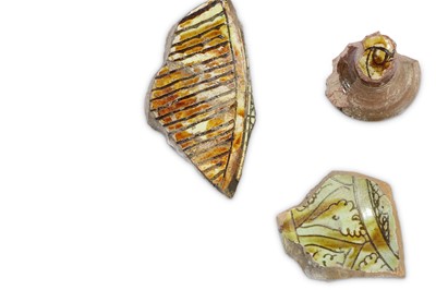 Lot 147 - A GROUP OF BYZANTINE GLAZED POTTERY FRAGMENTS ...