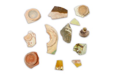 Lot 147 - A GROUP OF BYZANTINE GLAZED POTTERY FRAGMENTS ...