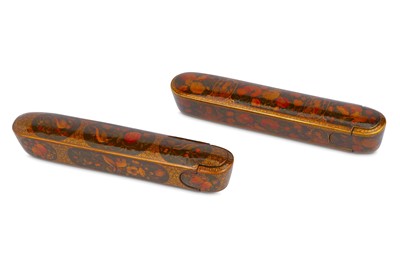 Lot 232 - TWO QAJAR LACQUERED PAPIER-MÂCHÉ PEN CASES...