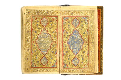 Lot 143 - A QAJAR MINIATURE QUR'AN Iran, dated 1231 AH...