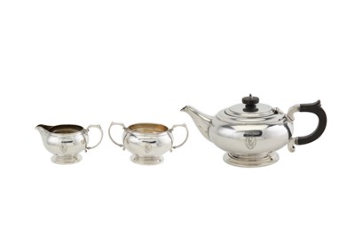 Lot 243 - A George VI sterling silver three-piece tea...