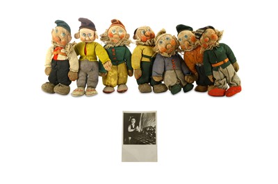 Lot 635 - Seven Walt Disney style cloth dwarves made as...