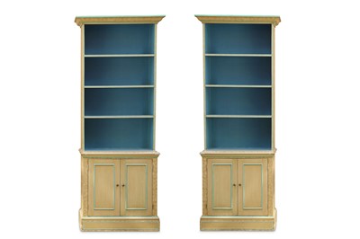 Lot 327 - A pair of 20th Century open bookcases, painted...