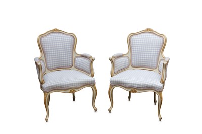 Lot 343 - A pair of French Louis XV style fauteuils, the...