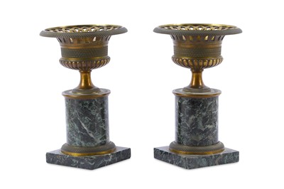 Lot 218 - A bronze garniture in the French Empire taste,...