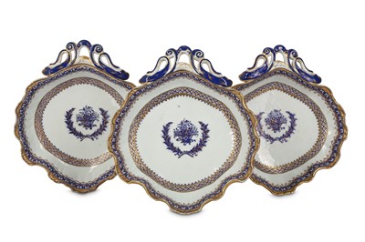Lot 428 - THREE CHINESE BLUE AND WHITE AND GILT 'SHELL'...
