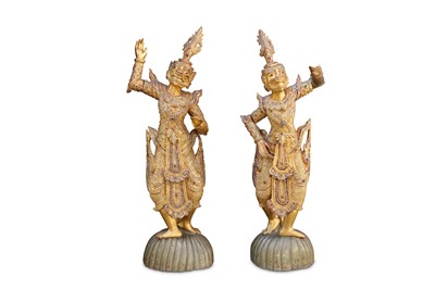 Lot 297 - A pair of Indonesian gilded carved wood and...