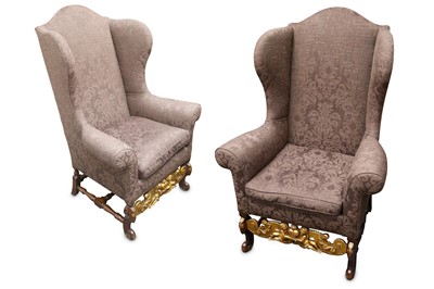Lot 380 - A pair of William and Mary style wing back...