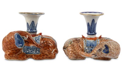 Lot 466 - A NEAR PAIR OF CHINESE 'ELEPHANT' CANDLE...