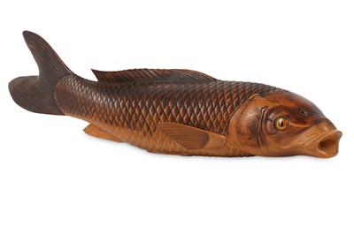 Lot 1071 - A WOOD OKIMONO OF A CARP. Meiji period....