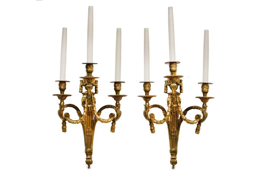 Lot 146 - A PAIR OF LOUIS XVI STYLE GILT BRONZE TRIPLE...