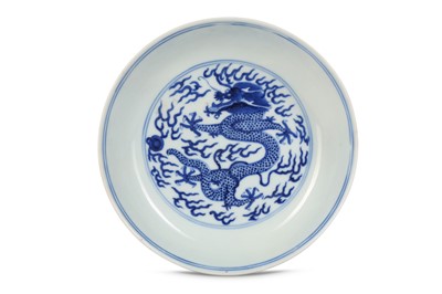 Lot 148 - A CHINESE BLUE AND WHITE 'DRAGON' DISH. Qing...