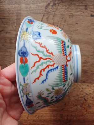 Lot 414 - A CHINESE WUCAI ‘DRAGON AND PHOENIX’ BOWL.