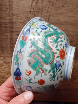 Lot 414 - A CHINESE WUCAI ‘DRAGON AND PHOENIX’ BOWL.