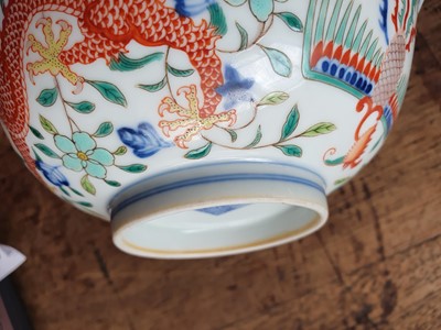 Lot 414 - A CHINESE WUCAI ‘DRAGON AND PHOENIX’ BOWL.