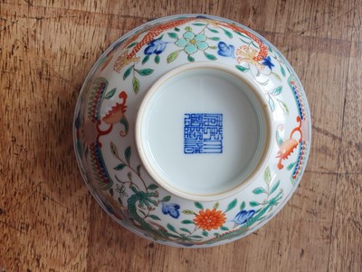 Lot 414 - A CHINESE WUCAI ‘DRAGON AND PHOENIX’ BOWL.