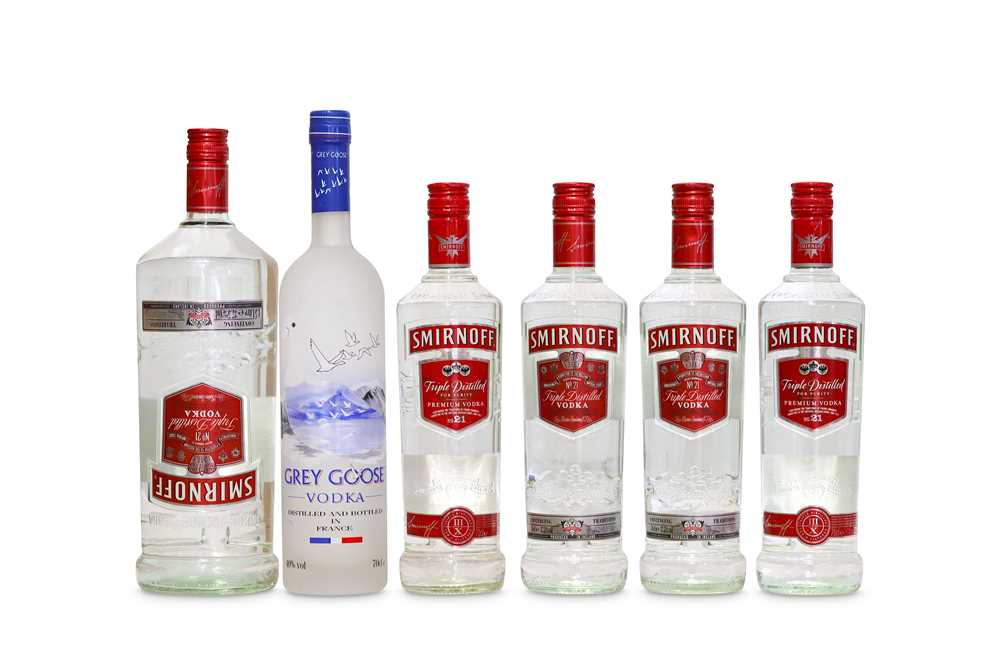 Lot 471 - Six Bottles of Vodka 4 Bottles of Smirnoff. 1...