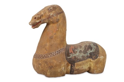 Lot 315 - A CHINESE POTTERY HORSE TORSO. Han Dynasty....