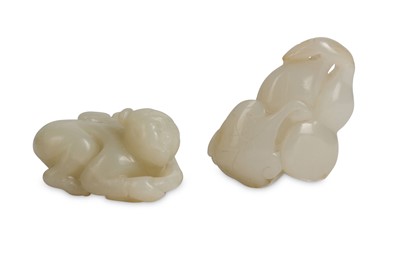 Lot 724 - A CHINESE PALE CELADON JADE CARVING OF A BOY...