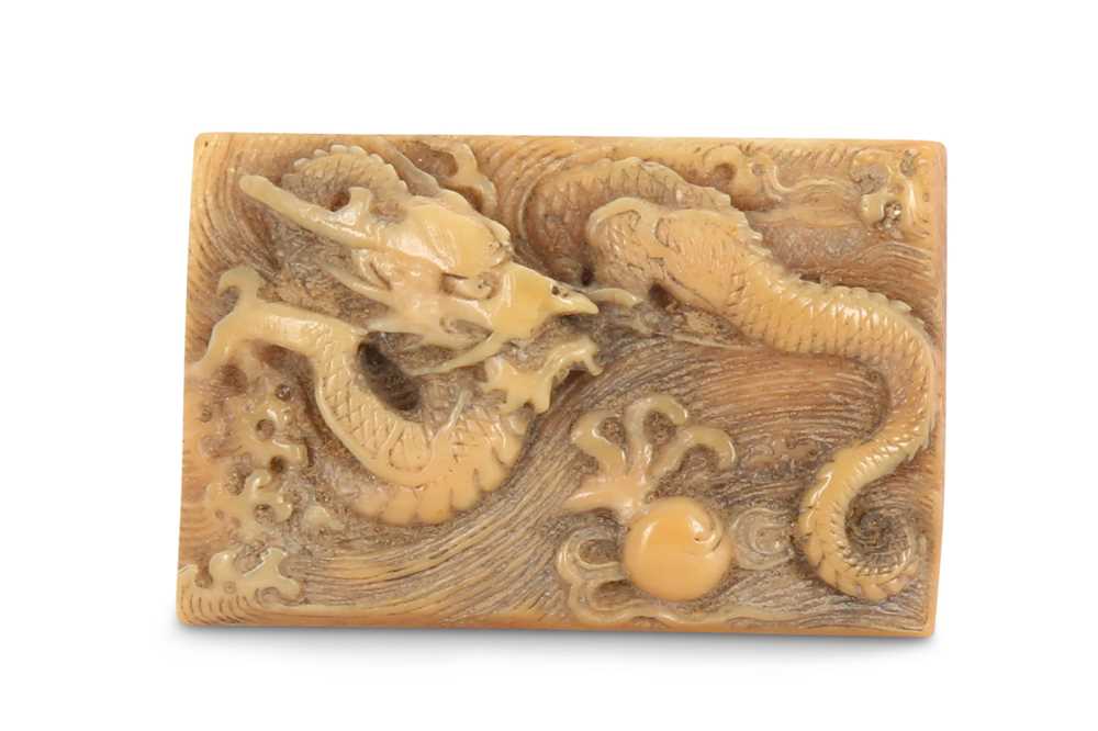 Lot 191 - AN IVORY RECTANGULAR 'DRAGON' PLAQUE. 18th /...